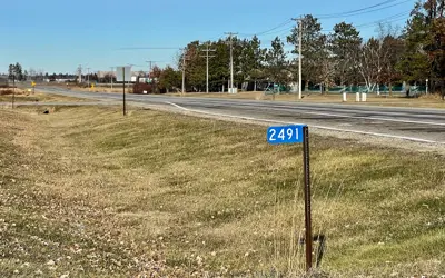 Blue address number sign